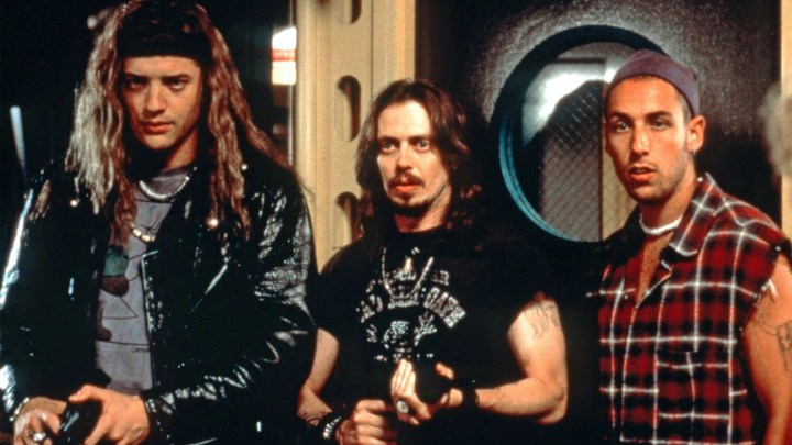 Brendan Fraser, Steve Buscemi, and Adam Sandler dressed like rockers in Airheads.