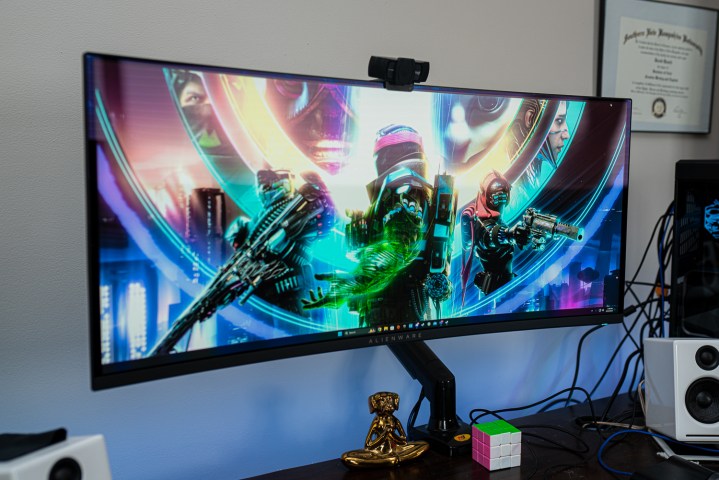 Alienware ultrawide OLED on a desk.